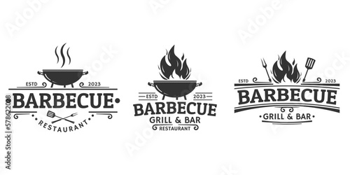 BBQ icon or label set. Barbeque logo. Grill bar, restaurant, steak house vintage badge design with fire flame, grill fork and spatula. Vector illustration.