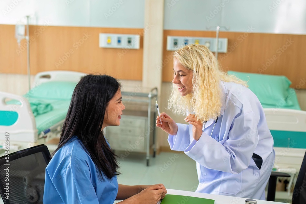 Young woman consult with doctor for botulinum toxin botox face injection at beauty treatment clinic Young woman consult with doctor for botulinum toxin botox face injection at beauty treatment clinic