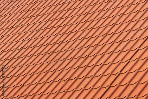 Texture of the roof tiles brown color