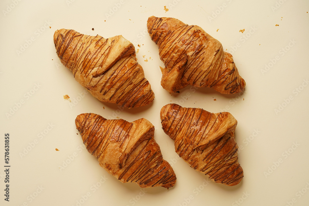 Traditional french croissant on pastel background