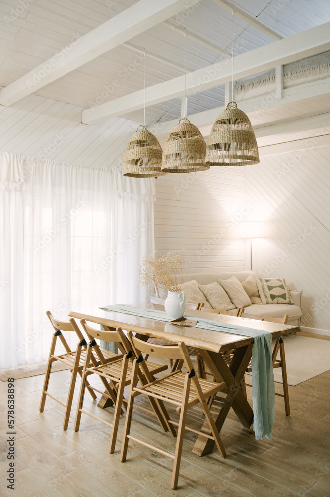 modern wooden house. Rich Scandinavian-style interior with wooden table in the living room