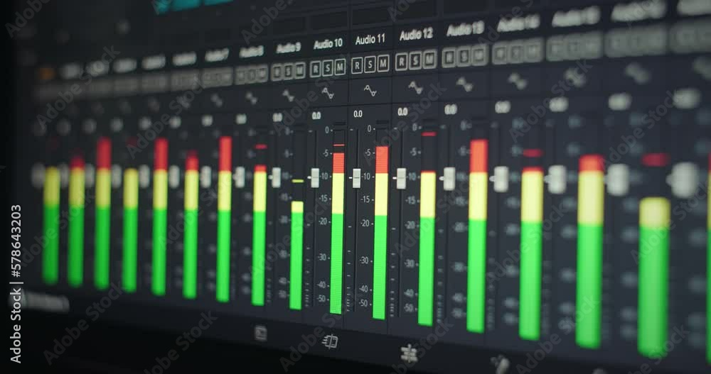Audio Levels Sound Mixing Faders in a Recording Studio Reveal. Music