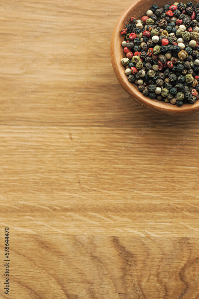 black red green white peppercorns, a mixture of peppers seasoning fragrant spice for fish meat close up on a wooden background
black red green white peppercorns, a mixture of peppers seasoning fragrant spice for fish meat close up on a wooden background