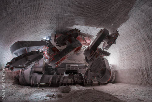 Drilling machine in deep salt mine.