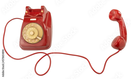 Konstfotografi Old red rotary dial telephone with handset and cord, cut out