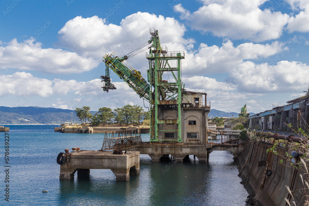 Dock with crane for coal loading.