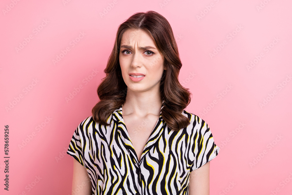 Photo of unsatisfied young pretty lady grin teeth misunderstanding isolated on pink color background Photo of unsatisfied young pretty lady grin teeth misunderstanding isolated on pink color background