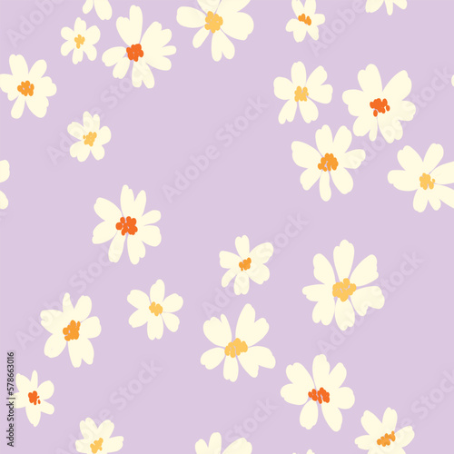 Seamless floral pattern, trendy ditsy print with cute white chamomiles. Spring botanical design: pretty hand drawn flowers buds in an abstract arrangement on a lilac background. Vector illustration.