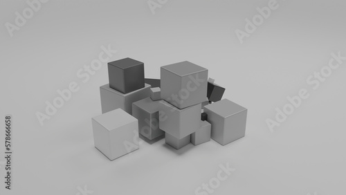 3d rendering of a set of monochrome cubes on a white surface. Cubes in a color range from black to white. Abstract composition.