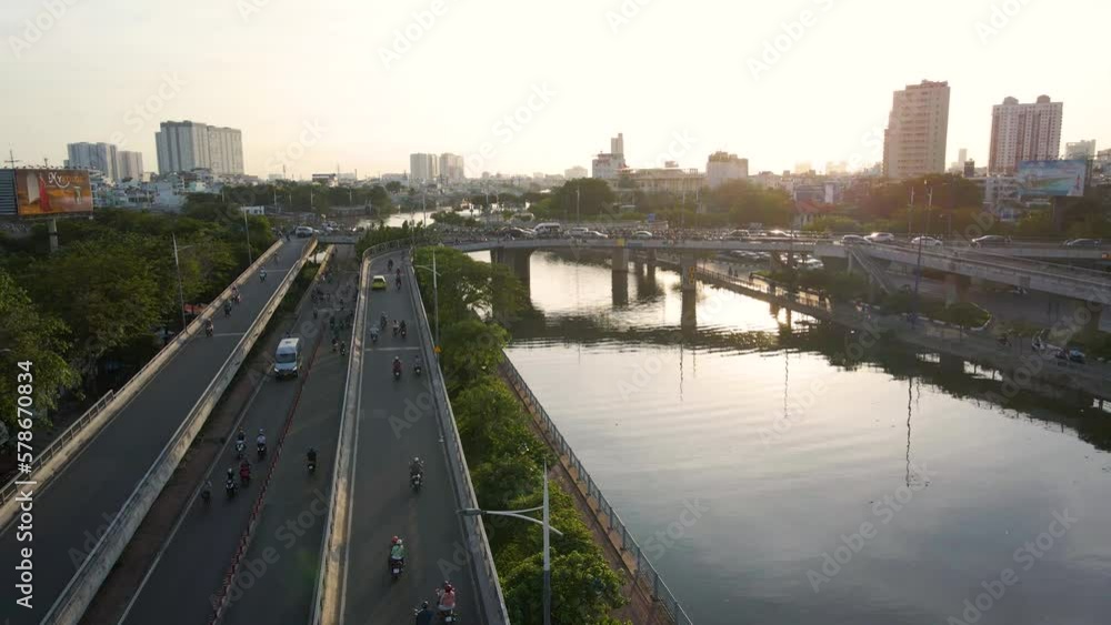 Motorcycles run on the bridge in the sunset afternoon Vietnam Motorcycles run on the bridge in the sunset afternoon Vietnam