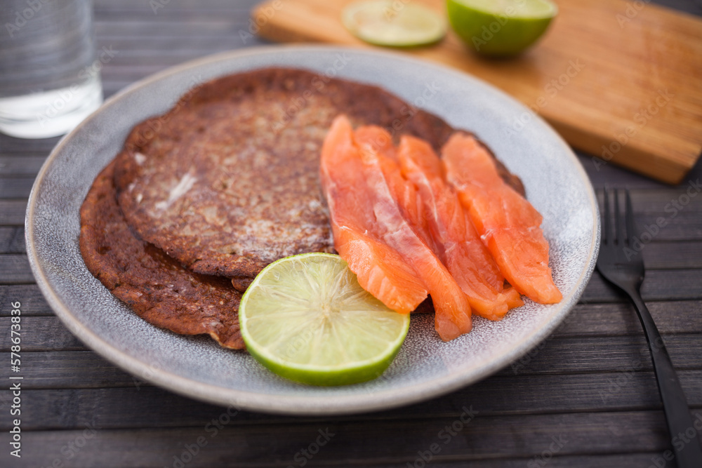 salted salmon fillet with buckwheat pancakes and lime salted salmon fillet with buckwheat pancakes and lime