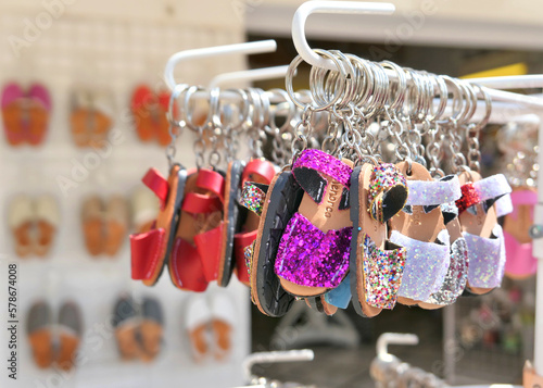 Keychains in souvenir shop in Ciutadella, Menorca island, Spain.Traditional Menorcan abarca sandals. photo