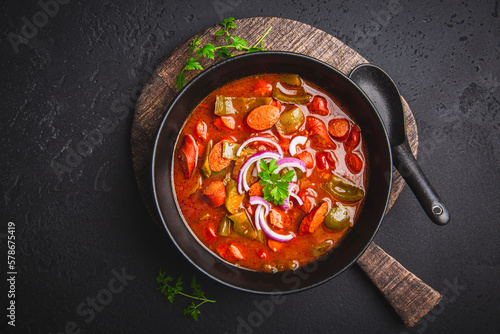 Traditional Solyanka soup - thick and sour soup of Russian origin photo