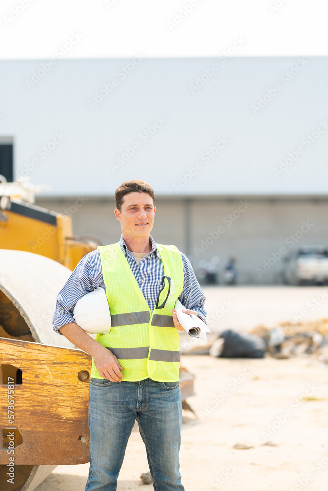 Civil Engineer smiling with Construction backgrounds, use for banner cover. Success in target of project goal Handsome Middle Eastern worker. Civil Engineer smiling with Construction backgrounds, use for banner cover. Success in target of project goal Handsome Middle Eastern worker.