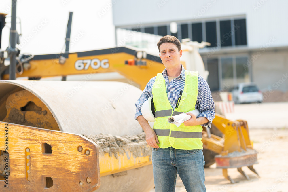 Civil Engineer smiling with Construction backgrounds, use for banner cover. Success in target of project goal Handsome Middle Eastern worker. Civil Engineer smiling with Construction backgrounds, use for banner cover. Success in target of project goal Handsome Middle Eastern worker.