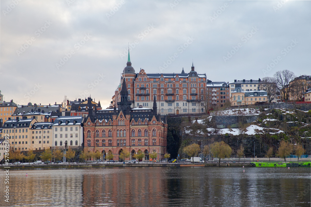 Stockholm Gamla Stan buildings at waterfront with reflections, Sweden