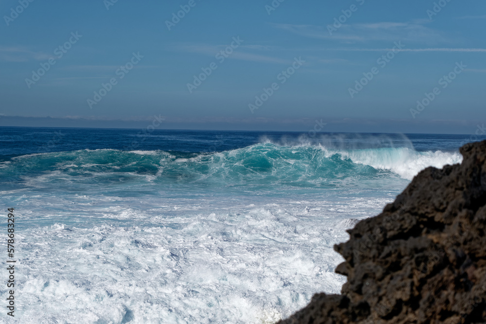 waves crashing on the rocks