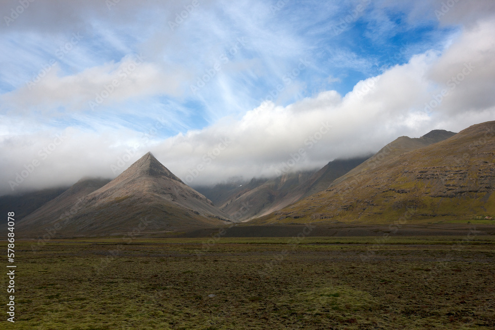 landscape with hills and clouds in iceland