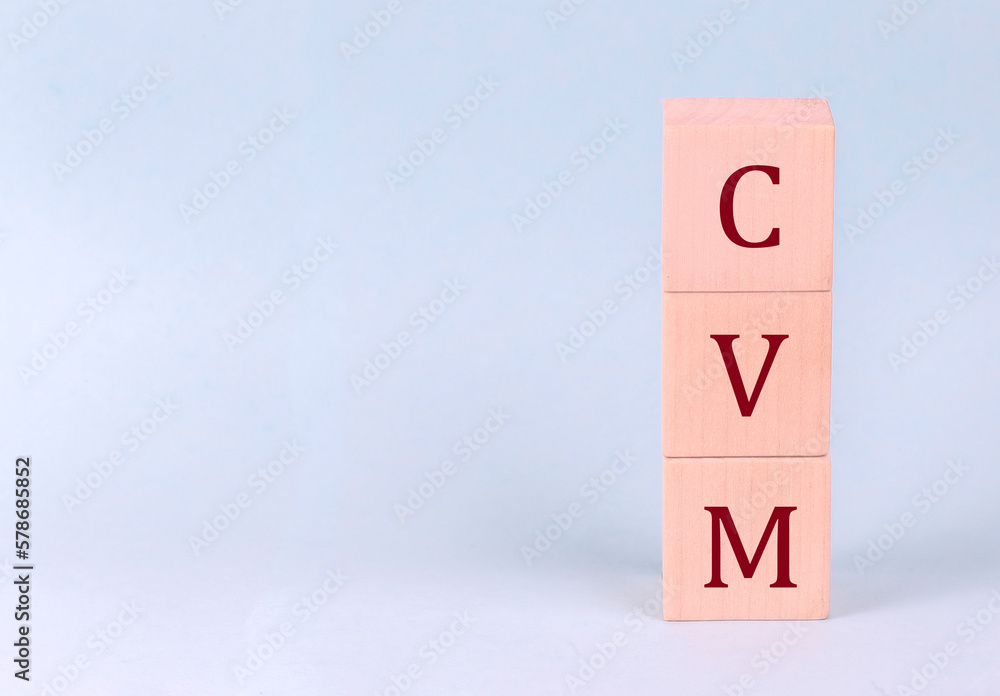 CVM on wooden cubes on a blue background CVM on wooden cubes on a blue background