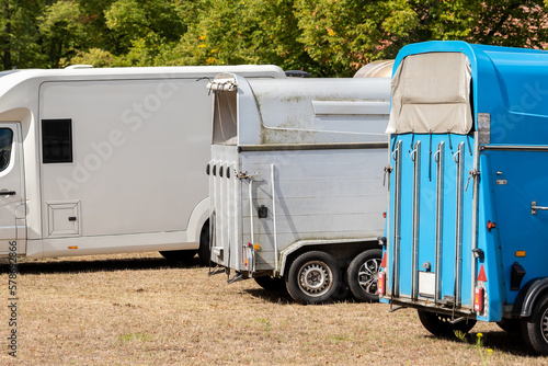 Fotografija Horse box cargo trailer transport and horse transportation van at farm or ranch