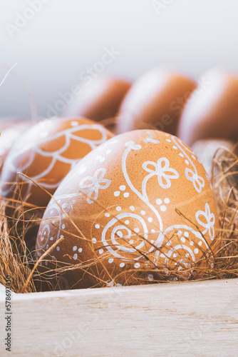 Canvas Print Hand painted floral pattern easter eggs in wooden crate