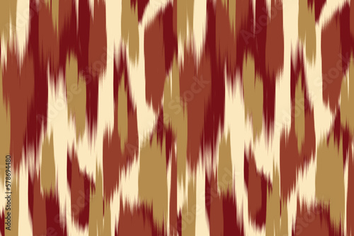 Uzbek ikat pattern and fabric in Uzbekistan. Abstract background for wallpaper, textures, textile, wrapping paper. photo