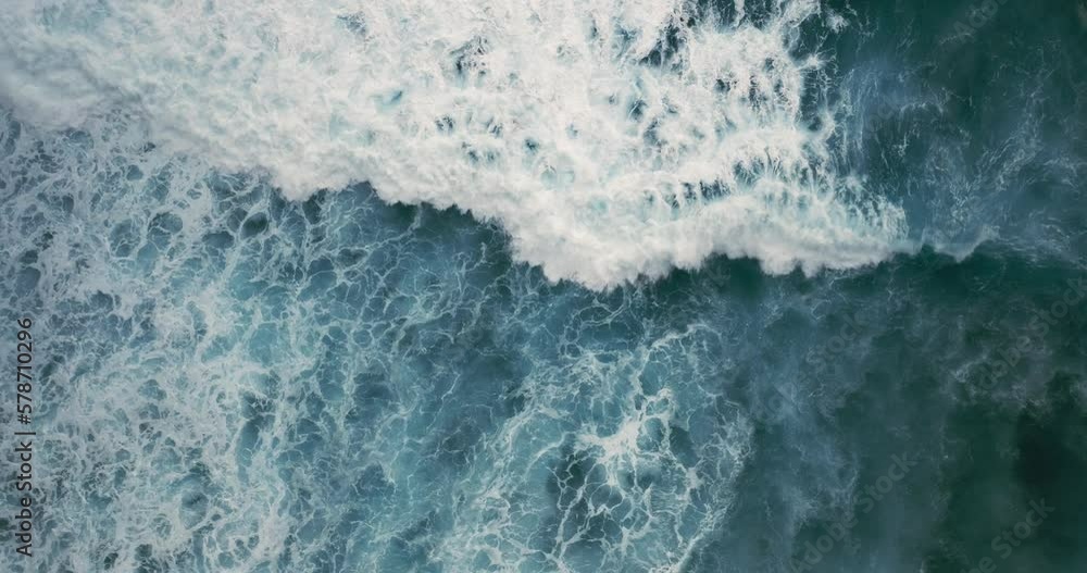 Top View of the Giant Waves, Foaming and Splashing in the Ocean, Indonesia, Bali Top View of the Giant Waves, Foaming and Splashing in the Ocean, Indonesia, Bali