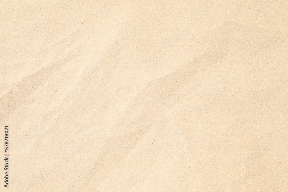 Fototapeta premium Brown kraft paper texture with crumpled lines