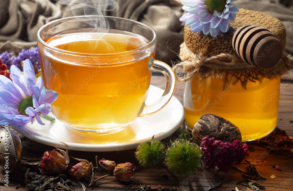 Hot sweet tea in a cup on old background Hot sweet tea in a cup on old background