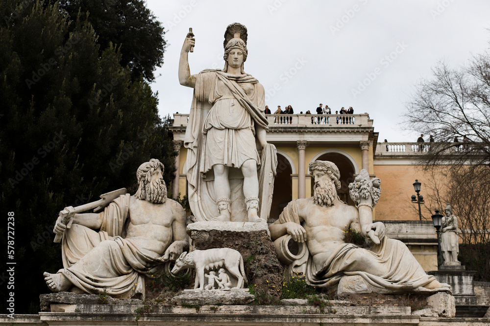 Statue of the goddess Roma flanked by representatives of Rome's two rivers, the Tiber and the Aniene. At the feet of the goddess is the she-wolf suckling the twins.
