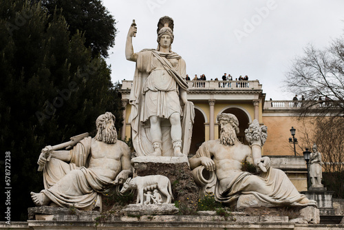 Statue of the goddess Roma flanked by representatives of Rome's two rivers, the Tiber and the Aniene. At the feet of the goddess is the she-wolf suckling the twins. photo