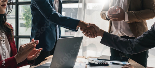 Fotografie Business people shaking hands, finishing up meeting, business etiquette, congratulation, merger and acquisition concept