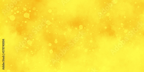 blur and defocused Yellow golden bokeh lights background, beautiful yellow watercolor background with glitter particles, yellow grunge texture background for wallpaper, invitation, cover and design. 