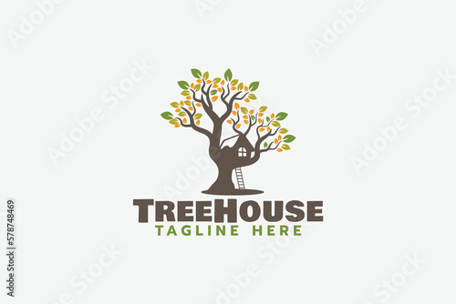 tree house logo with a beautiful tree house silhouette