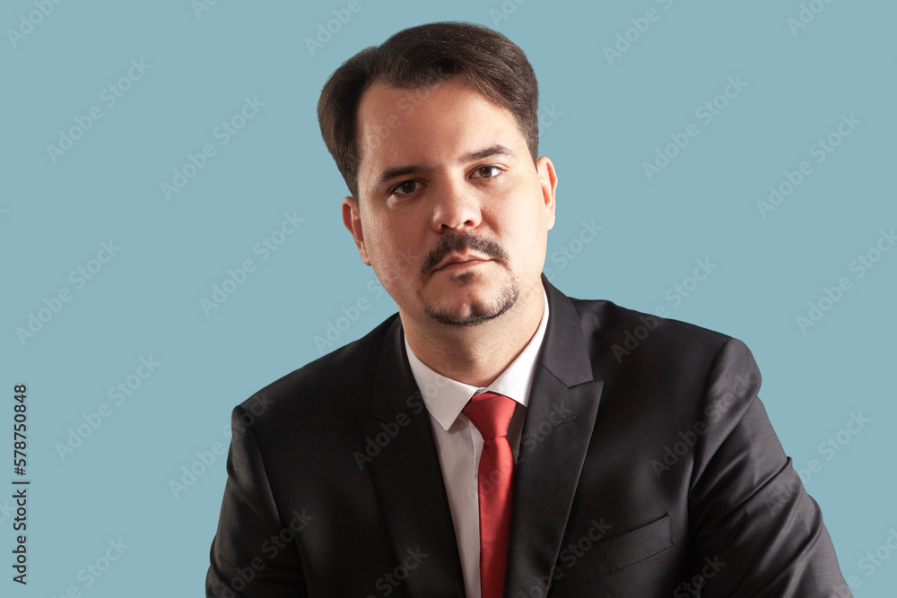 Serious concentrated man man with mustache looking at camera, being attentive and unsmiling. Serious concentrated man man with mustache looking at camera, being attentive and unsmiling.
