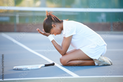 Tennis, stress and woman with depression on court after failure in match, game or competition. Mental health, anxiety and sad female athlete with headache, migraine or exhausted after sports exercise