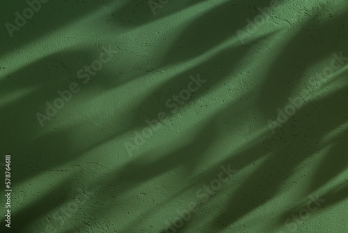 Green structure wall with leaves shadows. Background...