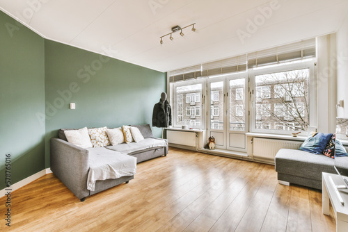 Interior of spacious living room with hardwood floor