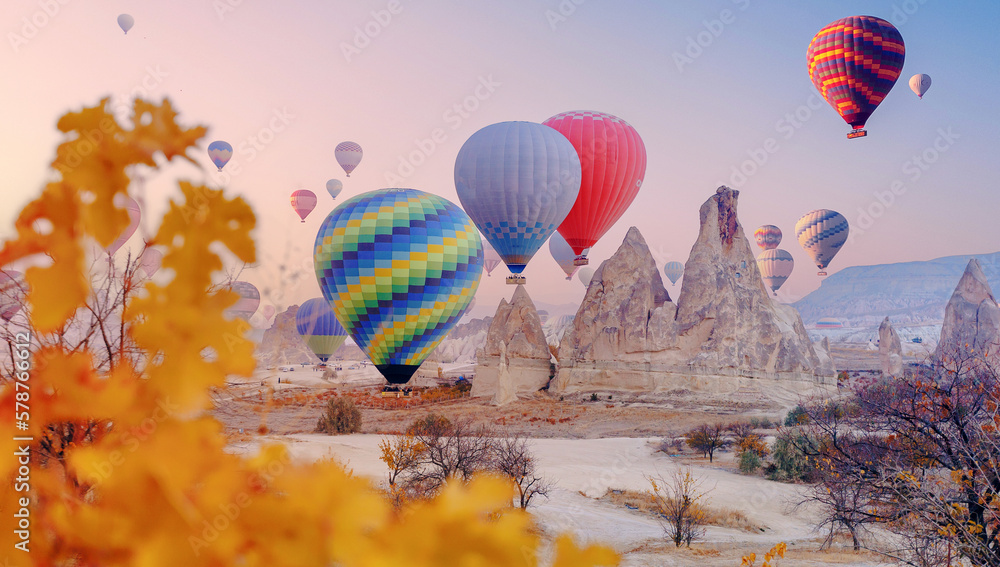 Landscape sunrise in Cappadocia with set colorful hot air balloon fly in sky with sun light. Concept banner tourist travel Goreme Turkey - obrazy, fototapety, plakaty 