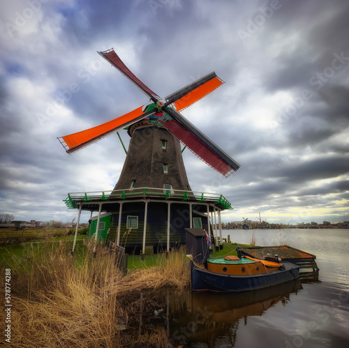 Moulin à vent dans la campagne hollandaise photo