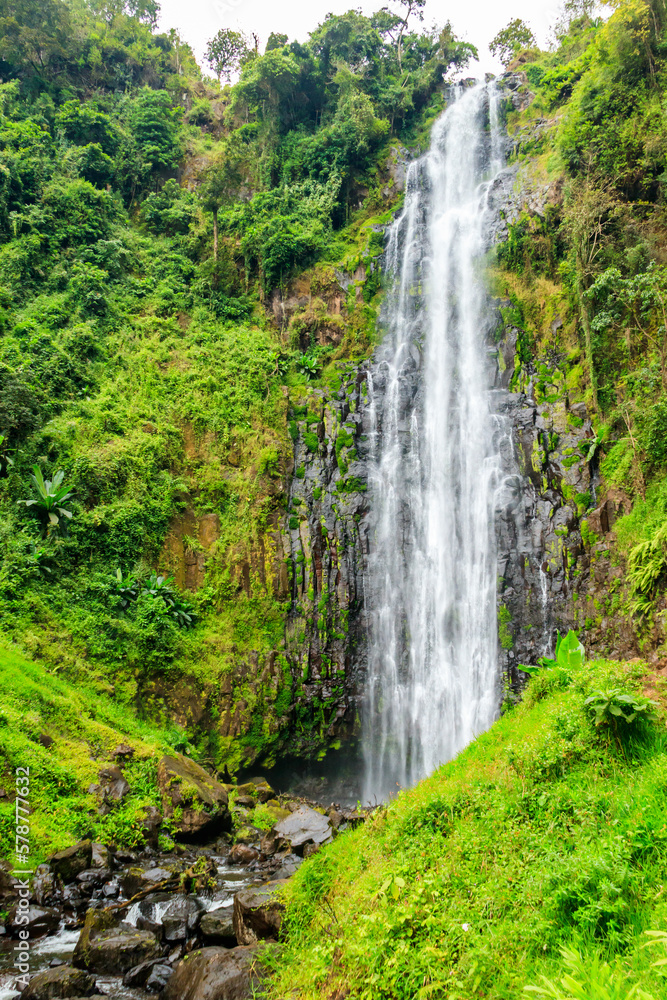 View of Materuni waterfall on the foot of the Kilimanjaro mountain in Tanzania View of Materuni waterfall on the foot of the Kilimanjaro mountain in Tanzania