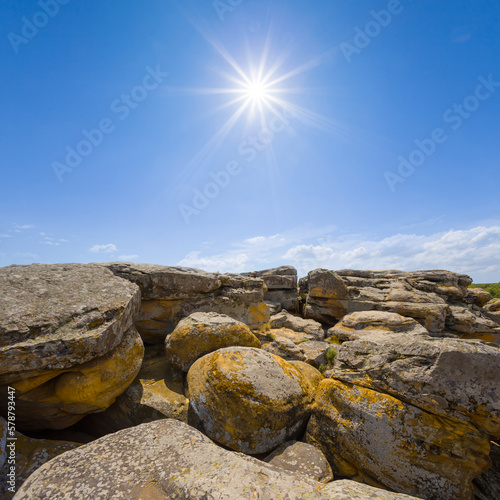 heap of huge stones under a sparkle sun