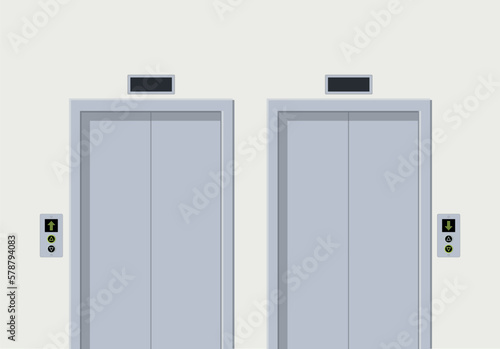 elevators with a panel of buttons in the corridor of the business center of the building