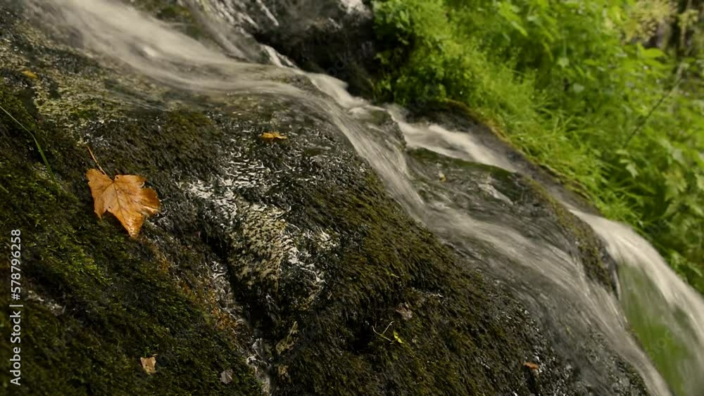 Waterfall in mountain torrent in spring. Waterfall in mountain torrent in spring.