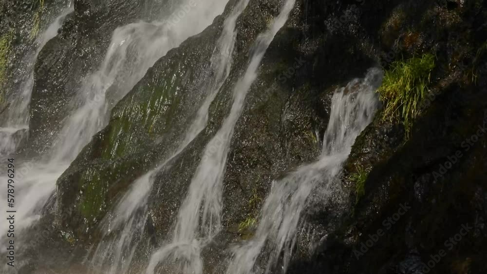 Waterfall in mountain torrent in spring. Waterfall in mountain torrent in spring.