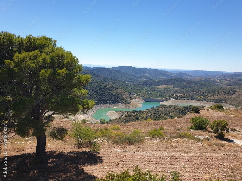 Dry Siurana reservoir during the summer, view of the medieval village of Siurana with the river almost dry, drought in Catalonia, Spain Dry Siurana reservoir during the summer, view of the medieval village of Siurana with the river almost dry, drought in Catalonia, Spain