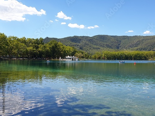 Turquoise lake Banyoles with boats, Spain photo
