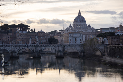 Sunset view on river tiber with St. Peter Basilic in Rome, Italy © olly_plu