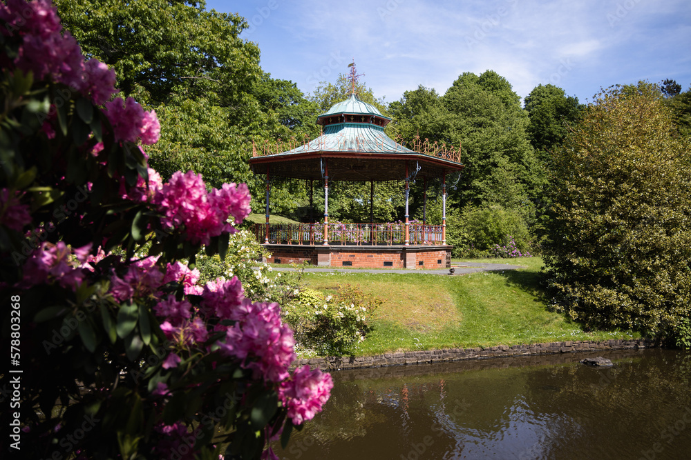 Victorian bandstand with flowers in springtime at Sefton park in Liverpool Victorian bandstand with flowers in springtime at Sefton park in Liverpool