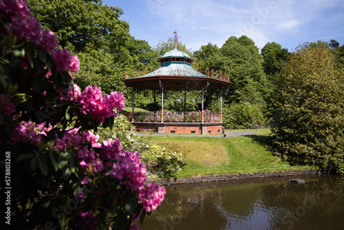 Victorian bandstand with flowers in springtime at Sefton park in Liverpool photo